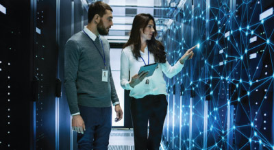 Businessman and woman in a data center