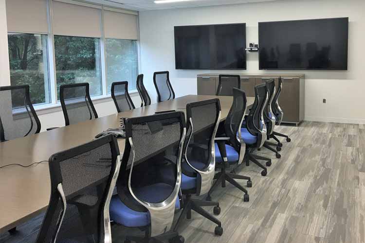 Dual 80” monitors with video conferencing